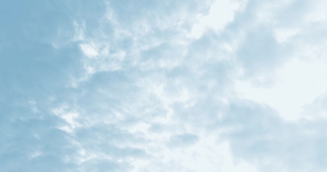 Serene Blue Sky with Soft Cloud Texture and Space for Text