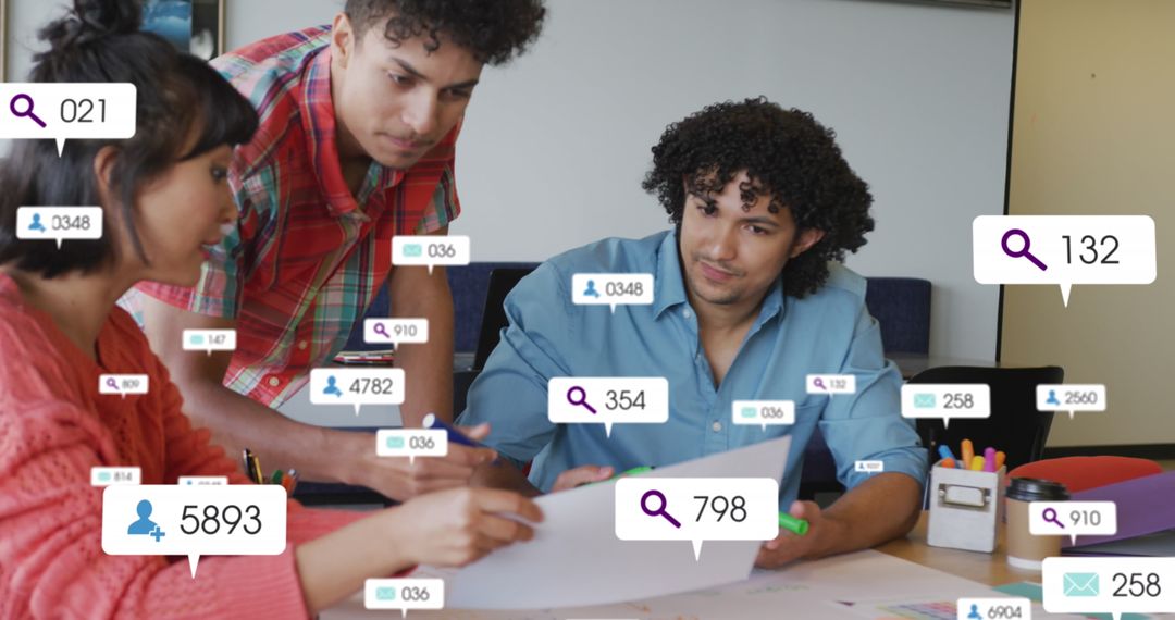 Architects Collaborating on Blueprint with Social Media Notifiers