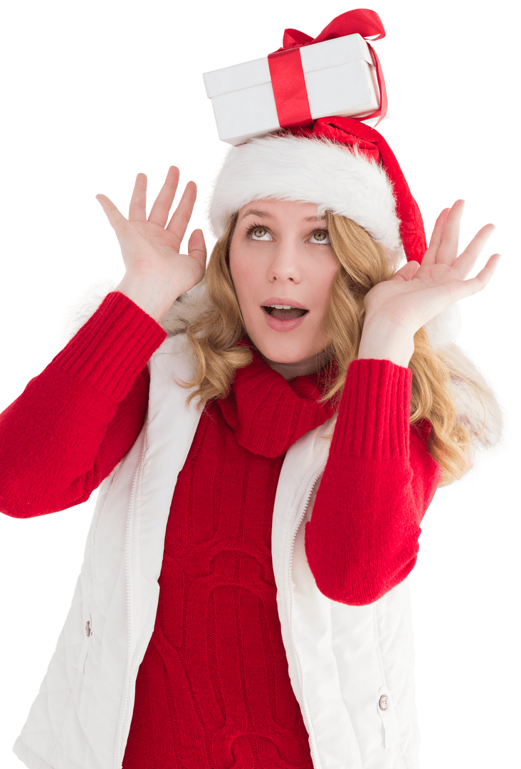 Woman in Santa Hat Balancing Gift on Head with Fascinated Expression