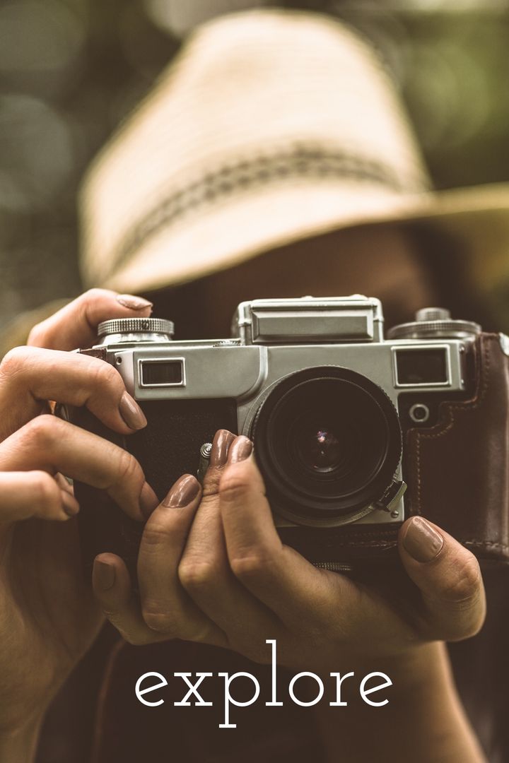 Vintage Camera in Hands Inspiring Wanderlust and Adventure