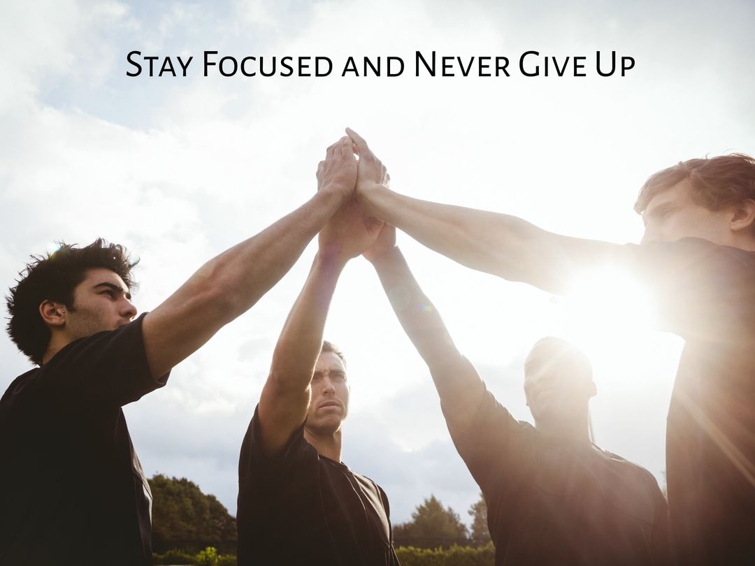 Motivational message, a team joining hands against a sunlit sky, symbolizing unity and perseverance - Download Free Stock Templates Pikwizard.com