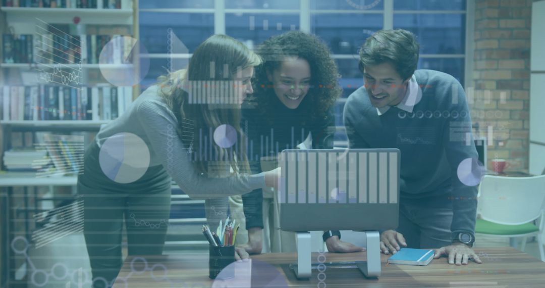 Diverse Team Reviewing Financial Data on Computer in Office Setting