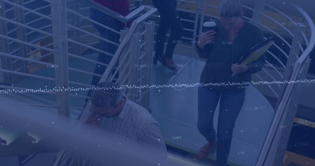 Diverse Professionals Collaborating in Modern Office with Technology