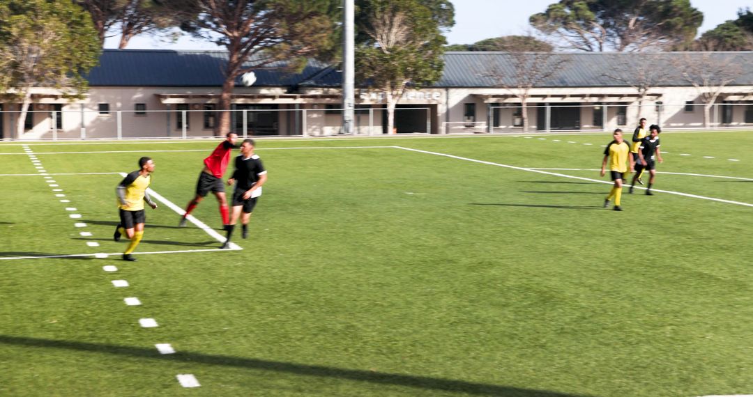 Intense Soccer Match with Teamwork and Competition