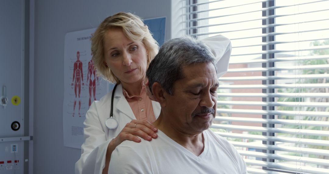 Doctor Examining Middle-Aged Man in Medical Office - Free Images, Stock Photos and Pictures on Pikwizard.com