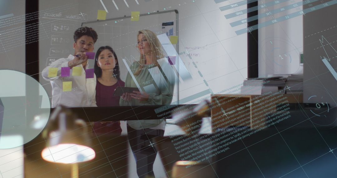 Team Analyzing Data Projections in Modern Office Environment