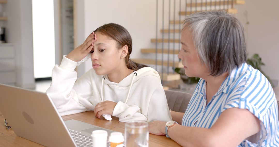 Intergenerational Family Support Over Health Concerns with Laptop