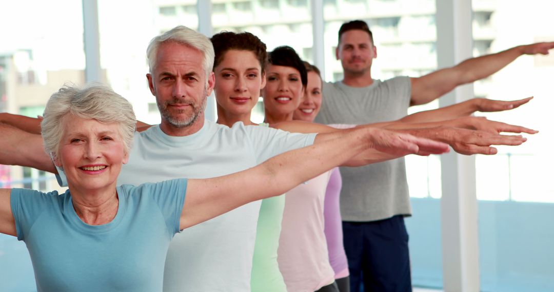 Group of Diverse People in Line Practicing Yoga - Free Images, Stock Photos and Pictures on Pikwizard.com