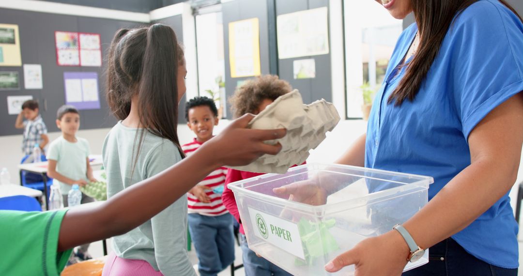 Children Recycling Paper in Classroom with Teacher Guidance