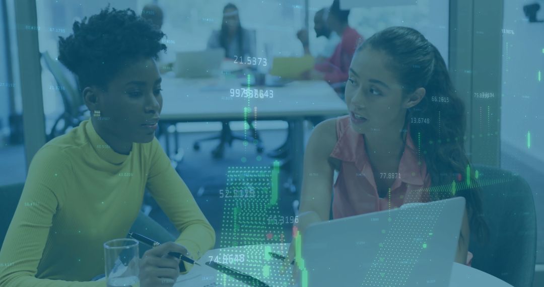 Diverse Business Team Analyzing Data Visualization on Laptop