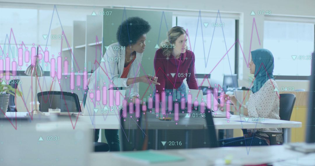 Team Collaborating on Data in Modern Office Environment