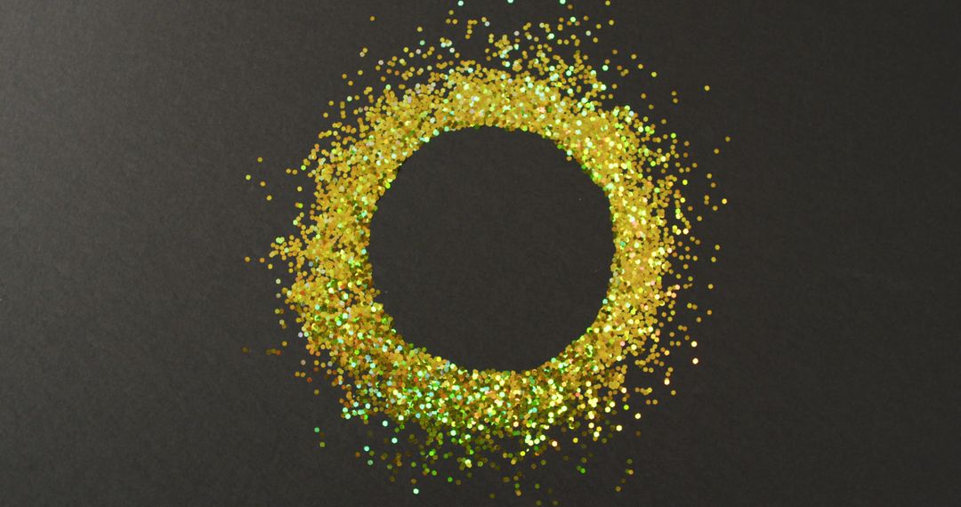 Ring of golden glitter on black background with copy space - Free Images, Stock Photos and Pictures on Pikwizard.com