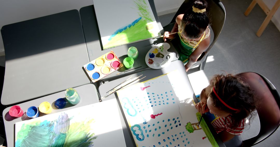 Children Engaging in Creative Painting During Art Class at School