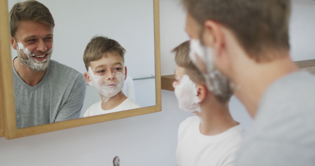 Father and Son Enjoy Shaving Together in Bathroom Mirror - Free Images, Stock Photos and Pictures on Pikwizard.com