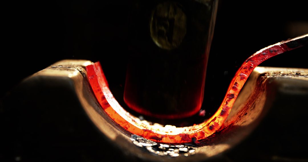 Close-Up of Blacksmith Forging Heated Iron