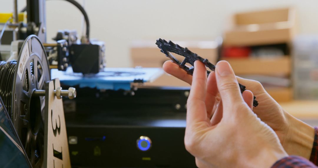 Engineer Evaluating 3D Printed Part in Workshop - Free Images, Stock Photos and Pictures on Pikwizard.com