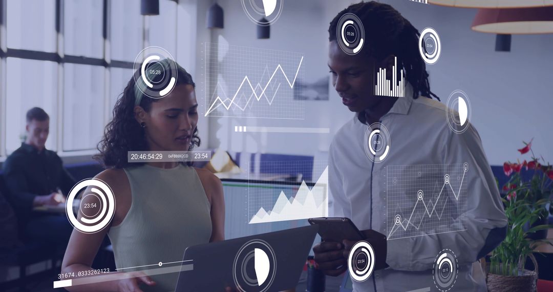Coworkers Analyzing Data with Interactive Digital Graphs in Modern Office