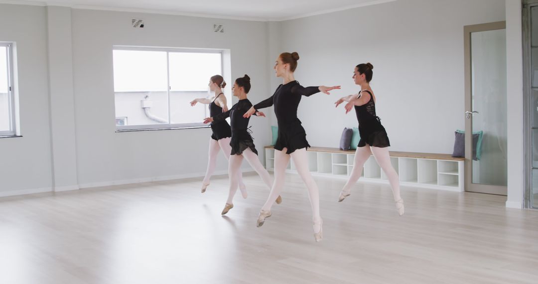 Ballet Dancers Practicing in Studio - Free Images, Stock Photos and Pictures on Pikwizard.com