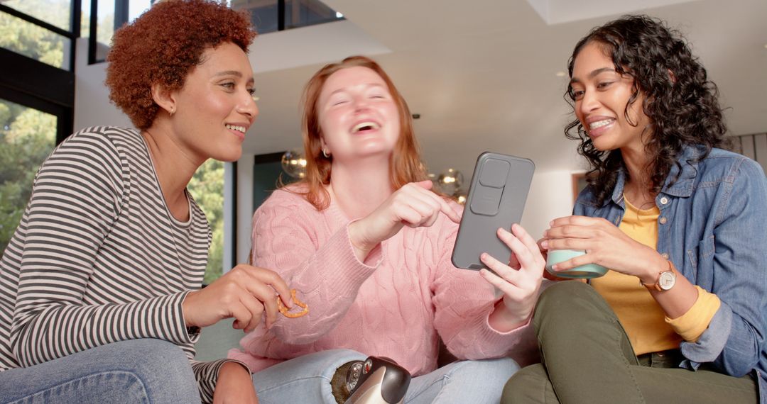 Diverse Friends Enjoying Time Together at Home in Relaxed Setting