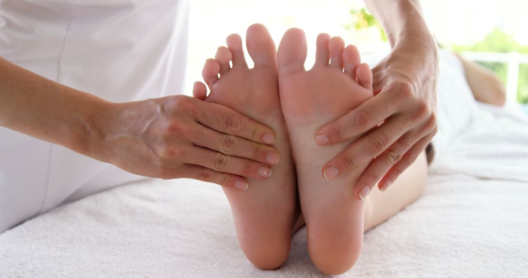 Professional Therapist Giving Relaxing Foot Massage in Spa - Free Images, Stock Photos and Pictures on Pikwizard.com