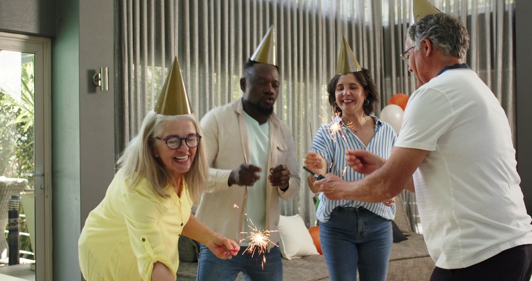 Colleagues Celebrating with Sparklers During Office Party