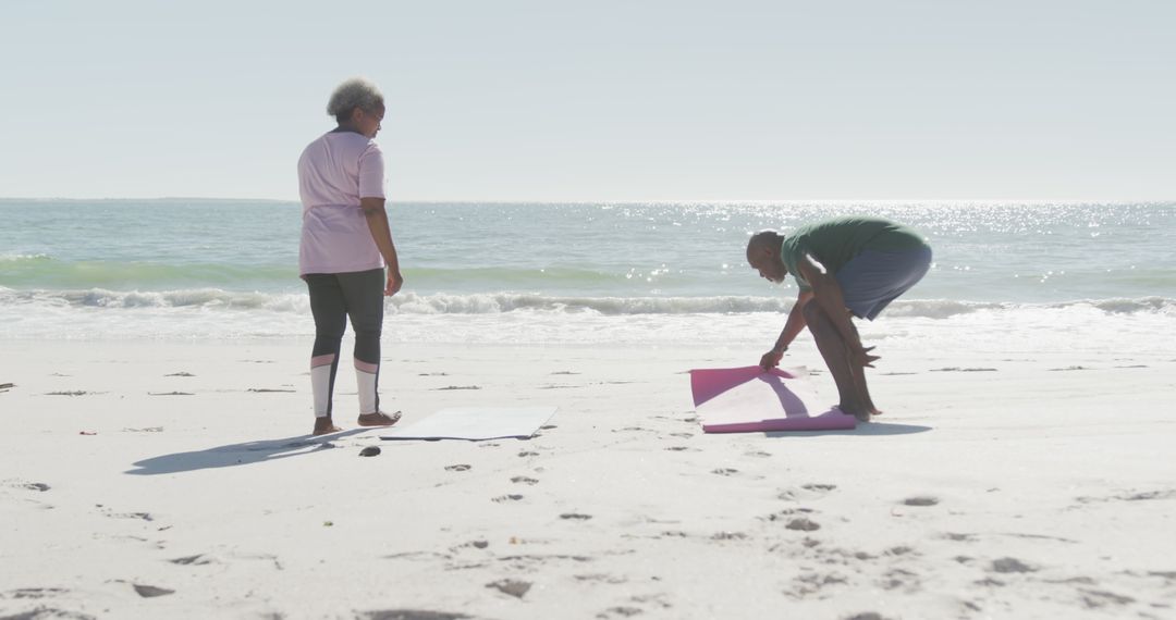 Senior Couple Enjoying Yoga on Beach - Free Images, Stock Photos and Pictures on Pikwizard.com