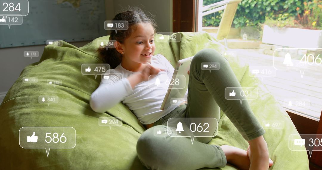 Smiling Girl Engaging with Social Media on Digital Tablet