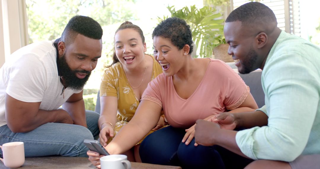 Diverse Friends Relaxing and Enjoying Time Indoors