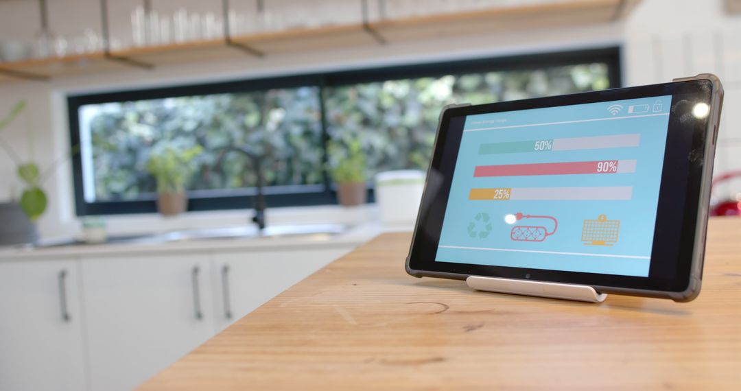 Tablet Displaying Energy Efficiency Data in Modern Kitchen - Free Images, Stock Photos and Pictures on Pikwizard.com