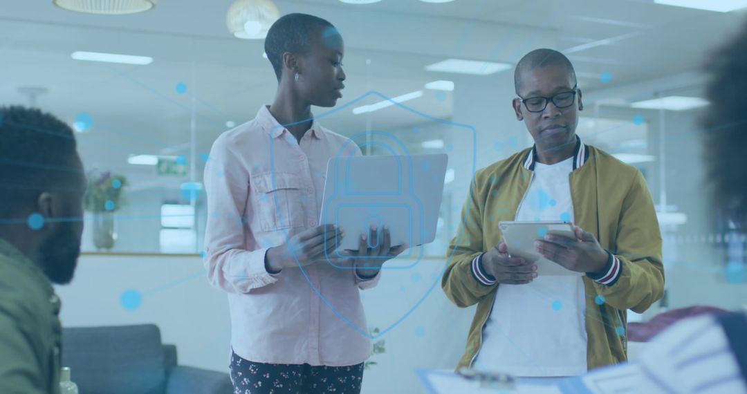 Diverse Team Discussing Technology Strategy in Modern Office