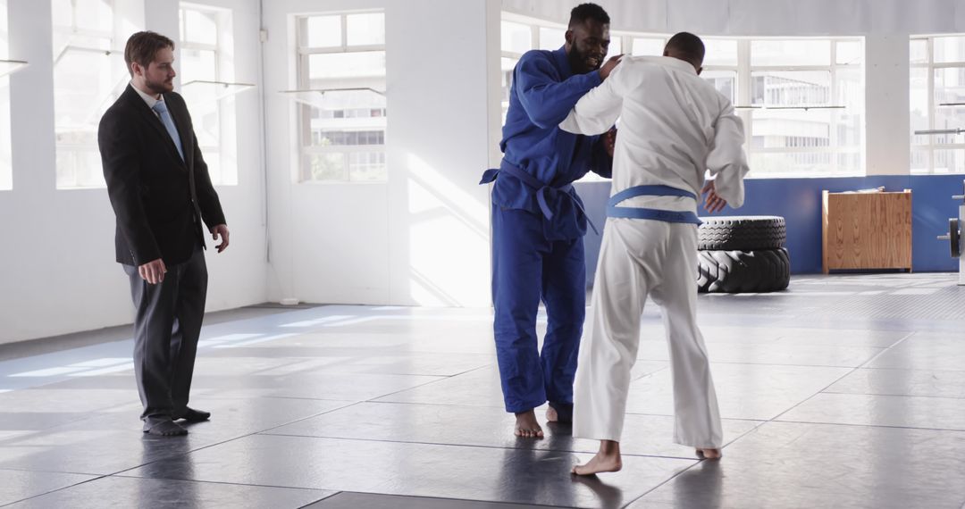Martial Arts Training Jiu-Jitsu Class with Focused Instructor