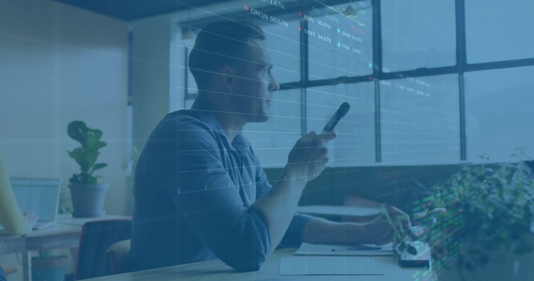 Businessman Analyzing Data Through Digital Interface