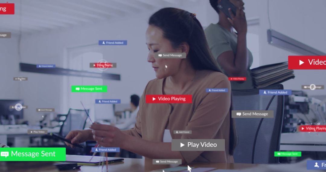 Asian Woman Using Tablet in Tech-Savvy Office with Streaming Notifications