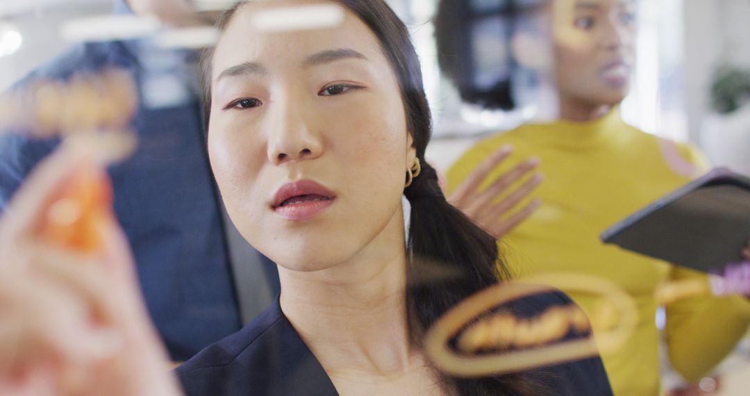 Collaborative Teamwork Brainstorm Session in Modern Office