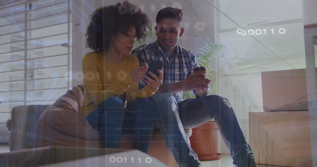 Couple Bonding Over Smartphone with Coffee in New Home