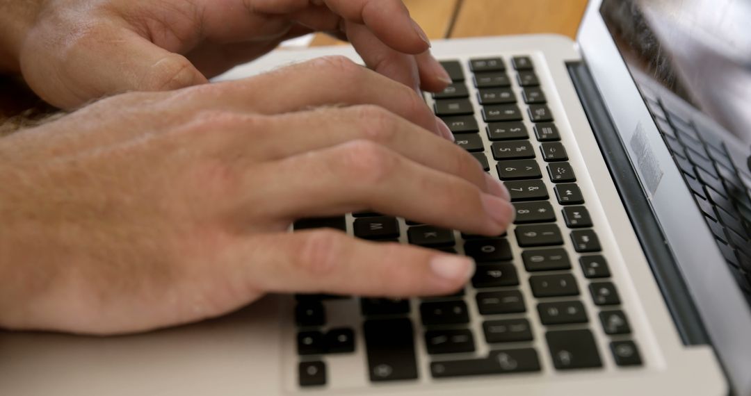 Close-Up Hands Typing on Laptop Keyboard - Free Images, Stock Photos and Pictures on Pikwizard.com