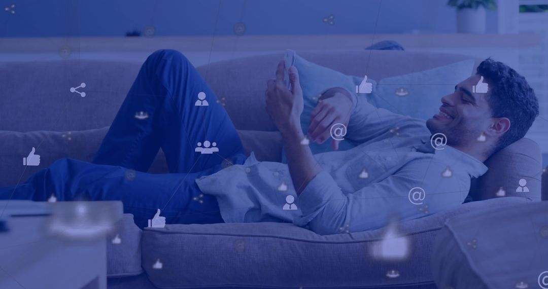 Young Man Enjoying Smartphone with Social Media Icons Overlay