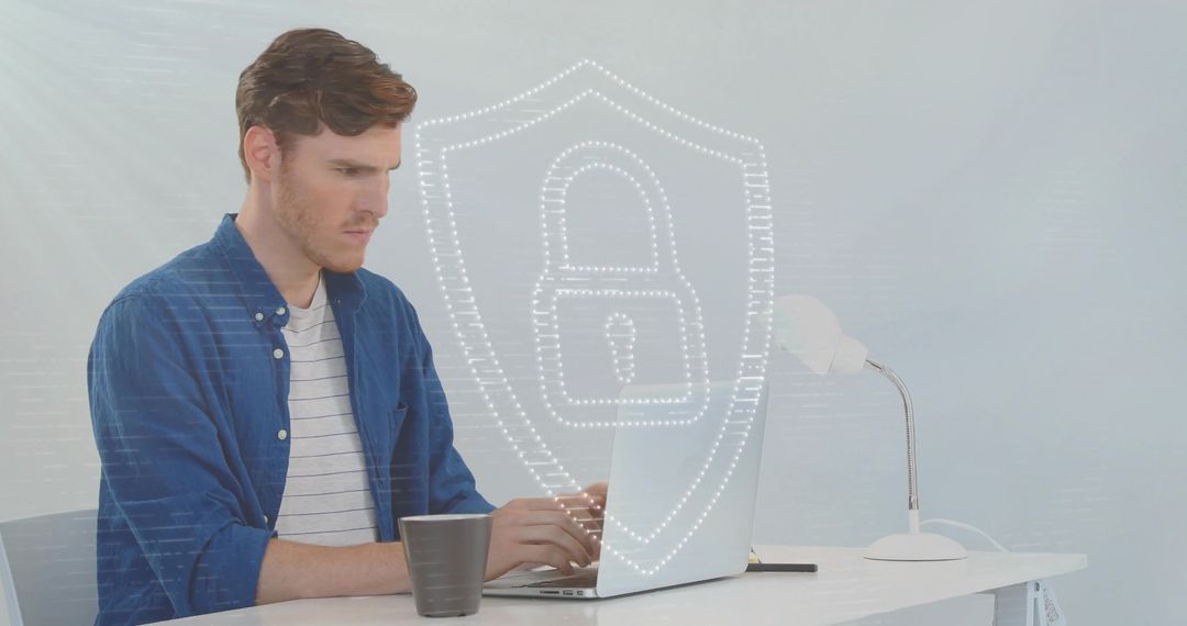 Man Typing on Laptop with Digital Security Shield Icon Overlay