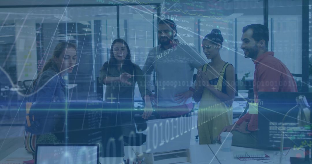 Young Professionals Analyzing Data in Modern Office Environment