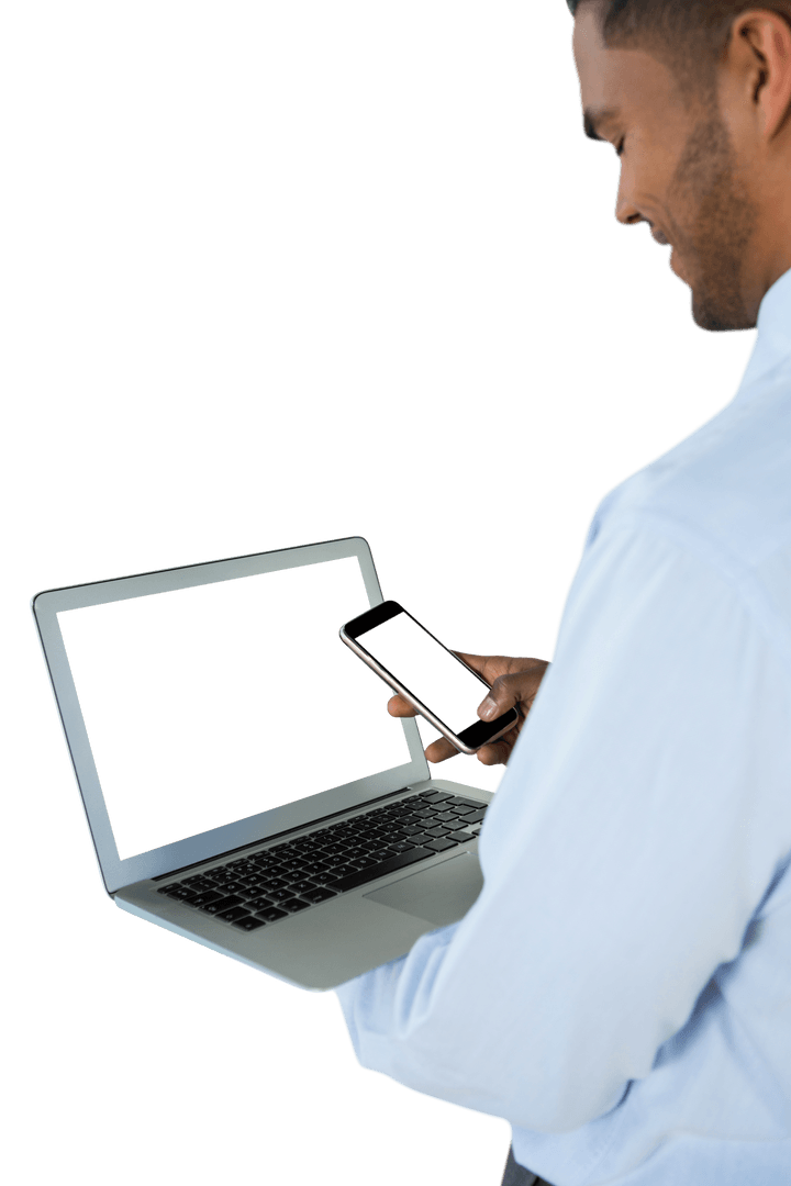 Transparent Image of Businessman Using Mobile and Laptop Simultaneously
