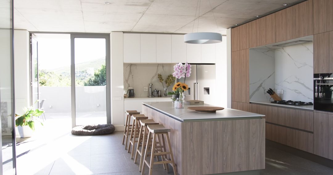 Contemporary Kitchen with Bar Stools and Bright Sunlit Interior