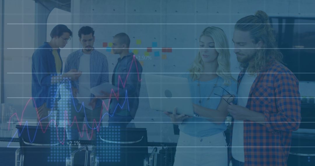 Business Team Collaborating on Digital Data Analysis in Modern Office