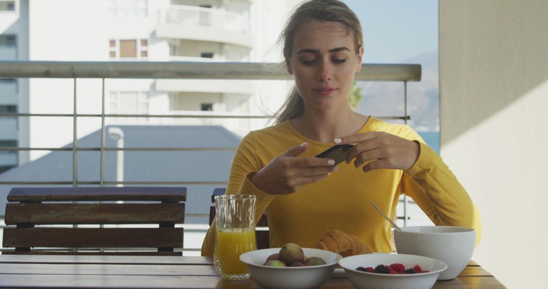 Woman Photographing Delicious Breakfast on Balcony During Quarantine - Free Images, Stock Photos and Pictures on Pikwizard.com