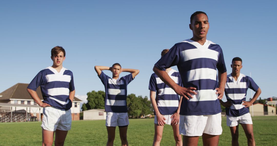 Confident Rugby Players in Team Jerseys Standing on Field - Free Images, Stock Photos and Pictures on Pikwizard.com