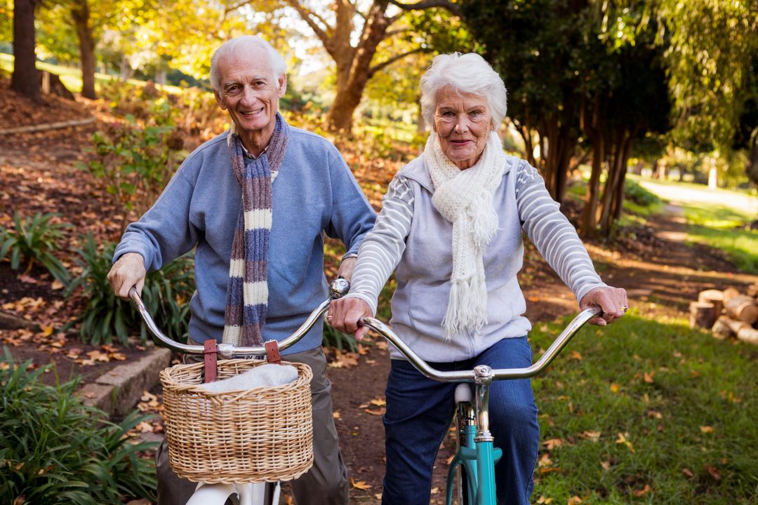Senior couple riding their bike - Free Images, Stock Photos and Pictures on Pikwizard.com