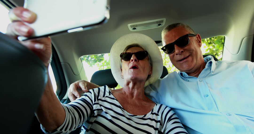 Senior Couple Taking Selfie in Car with Sunglasses and Summer Outfit - Free Images, Stock Photos and Pictures on Pikwizard.com