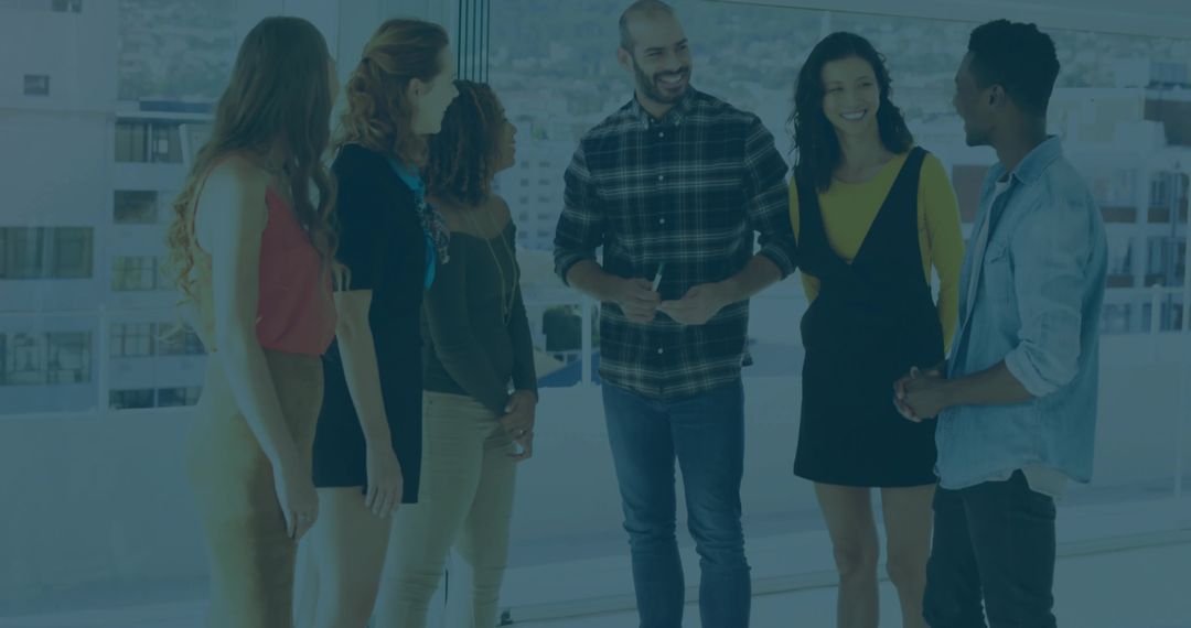 Diverse Team Collaborating in Modern Office with City View