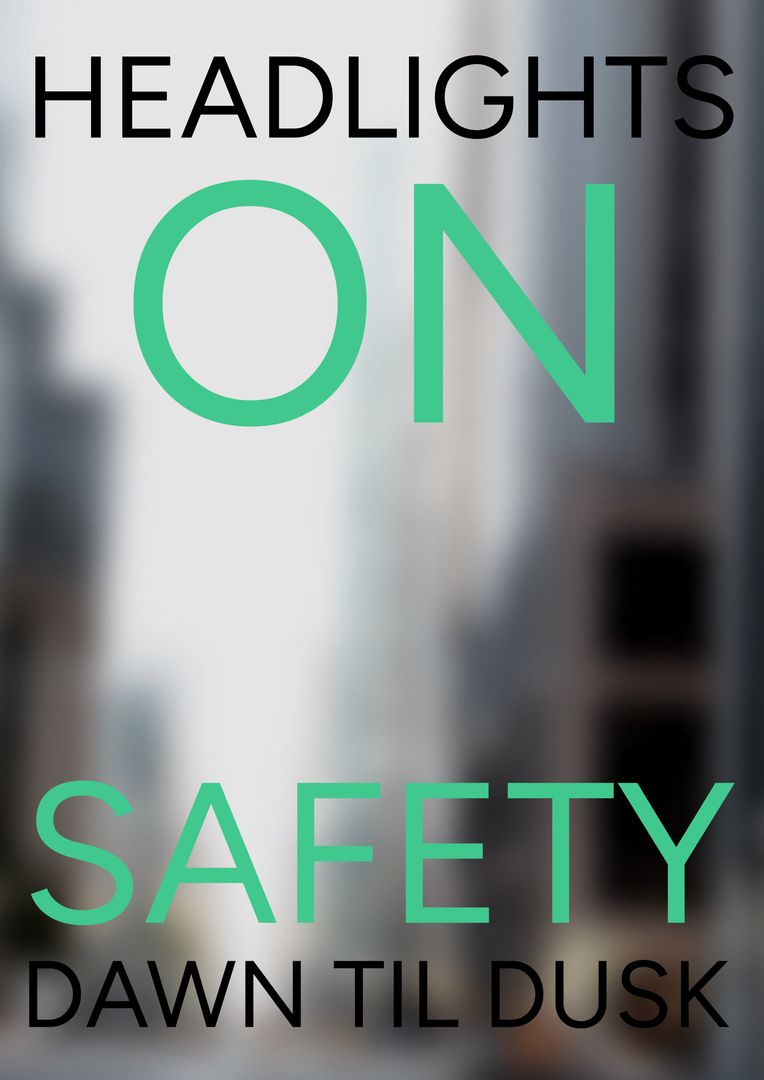 Urban Road Safety Message with Green Text Over Cityscape