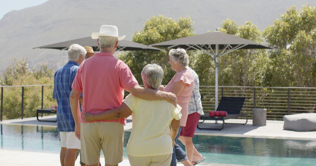 Happy Seniors Socializing by Swimming Pool in Summer - Free Images, Stock Photos and Pictures on Pikwizard.com