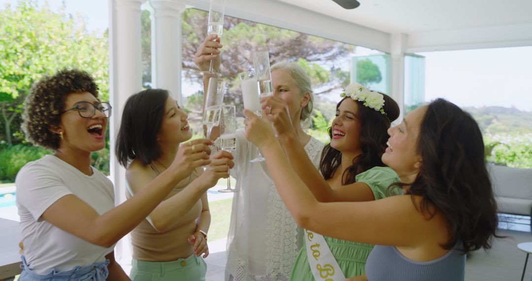 Women Toasting with Champagne at Outdoor Bridal Shower Celebration